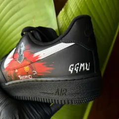 The other side of the Manchester United custom kicks, featuring Kobbie Mainoo. The "GGMU" detail makes it extra special for true supporters.