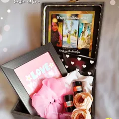 The "Bestie Edition" hamper is one of my favorites. It’s packed with personal photos, a "Love Your Self" frame, and other goodies to make her feel cherished.