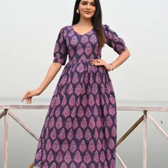 My Bagru hand-block printed dress in a striking purple and pink pattern. This design features a V-neck and puff sleeves, crafted from premium 60*60 pure cotton.