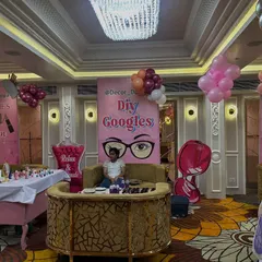 This setup shows one of the activity zones from a princess party, featuring a "DIY Goggles" station. We love adding interactive elements that match the theme to keep the young guests entertained.