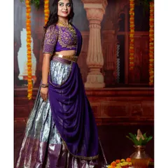 A full-length view of the purple and silver half-saree against our traditional palace backdrop, creating a complete ethnic look.