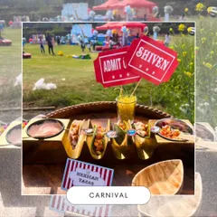 Delicious Mexican Tacos served with custom 'Admit One' ticket toppers for a carnival party. In the background, you can see the large, festive outdoor setup, showing how the food is part of a bigger experience.