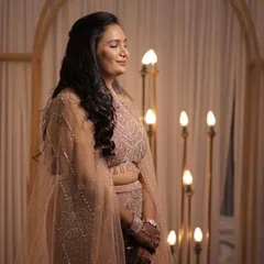 This candid shot highlights the intricate beadwork on the blouse and the soft, flowing tulle of the cape. It’s a beautiful example of the detailed craftsmanship available in my rental collection.