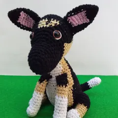 Another angle of the handmade dog toy, highlighting its big ears and sweet expression. I try my best to capture the personality of each pet from the photos I receive.