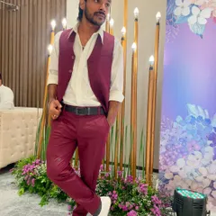 Another angle of my new look, with a waistcoat. I believe in dressing well for the events I choreograph.