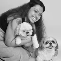 A moment of pure, candid laughter. The joy in this photo is palpable, and the black and white format makes it feel classic and everlasting.
