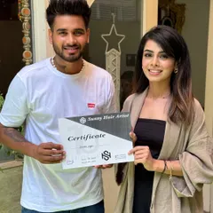 Presenting a certificate of completion. I believe in empowering my students with the skills and the credentials to build their own success stories.