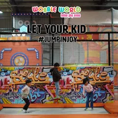 Let them jump for joy! Our trampoline park is the heart of Wobble World, offering endless space for kids to bounce, play games, and burn off energy in a safe, netted environment.