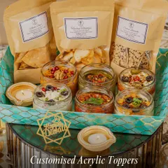 Make it truly yours. We offer custom acrylic toppers for any special occasion, like this 'Happy Diwali' one, to add a festive and personalized flair to your gourmet hamper.