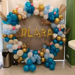 A clear, centered shot of the 'OLARA' balloon ring, showcasing the beautiful color combination.