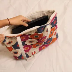 Many customers ask if this tote can hold a laptop, and the answer is yes. Here you can see how easily a standard laptop fits inside, with a secure zip closure to keep everything safe. It’s a stylish and practical handmade laptop bag.