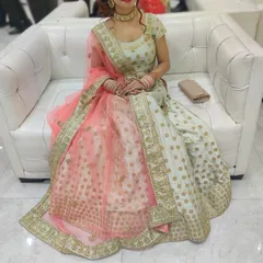 A client looking elegant in a rented choker set. She paired it with a pista green lehenga and peach dupatta, showing how my jewellery can complement a variety of colorful Indian outfits for a wedding function.