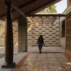 This is from our Kaattu Veedu Guesthouse project, where we embraced earthy and sustainable design. The shaded verandah features handmade Athangudi tiles and restored wooden columns from old homes in Karaikudi, connecting the space to both nature and history.