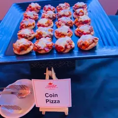 Bite-sized Coin Pizzas served as appetizers at a channel partner meet for JP Infra. These are a perfect mess-free finger food option for professional networking events.