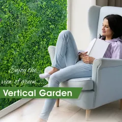 Imagine enjoying your morning tea with a view like this, right inside your home. This artificial vertical garden installed next to a window brings the freshness of the outdoors in, creating a peaceful reading nook. It's a perfect way to enjoy greenery year-round.
