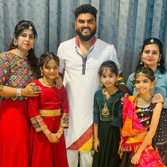 A happy moment with students and fellow instructors after a successful Raas Garba workshop. We love building a community around dance and celebrating together.