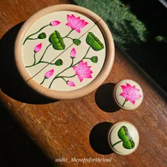 I love how these hand-painted furniture handles turned out. The Pichwai-inspired lotus design adds a pop of bright pink and green, completely transforming a simple TV unit with a touch of traditional Indian art.