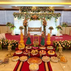 For traditional events like a naming ceremony, we create an atmosphere of grace and celebration. This stage includes a beautifully decorated floral cradle, an elaborate display of traditional sweet's and fruit's, and classic doll's, all set against a backdrop of fresh flower's.