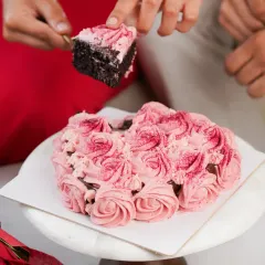 Food is about connection and celebration. For this Valentine's Day shoot, I focused on capturing a sweet, intimate moment, telling a story that makes the product, a beautiful heart-shaped cake, part of a cherished memory.