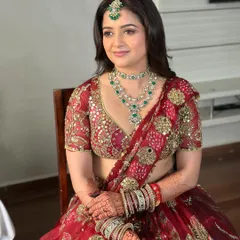Seated portrait of my bride, looking ethereal and elegant. The makeup is designed to last through all the moments of her special day without feeling heavy.