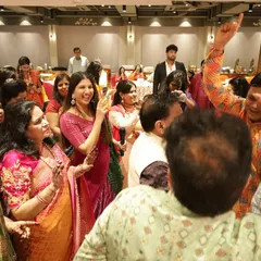A candid shot of me laughing with the guests during a Mayra function. Even traditional ceremonies can be filled with lightheartedness and joy.