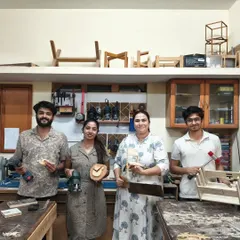 Look at these smiles. This is what a typical weekend at the workshop looks like. People from all walks of life, most with zero prior experience, holding something they built with their own hands. We made everything from clocks to small tables this day.