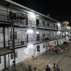 A night view of the completed G+2 prefabricated labor colony for Leighton India in Mumbai. This 22,322 sq. ft. project showcases our ability to deliver quality and efficiency on a large scale.
