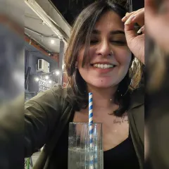I appoint myself the poster girl for "work hard, play hard." Enjoying a drink and a smile, because balance is everything.