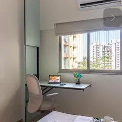 A wall-mounted extending study table is a fantastic space-saving solution for a compact bedroom, providing a functional workspace that remains clutter-free.
