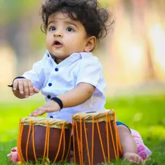 Introducing the next tabla sensation. Using musical instruments as props can be a wonderful way to add a personal and playful touch to your child's portrait session.