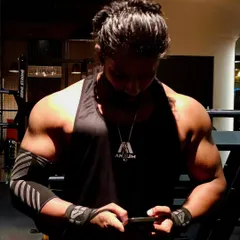Every rep builds the beast. Here I am checking my plan between sets, ensuring every part of the workout has a purpose.