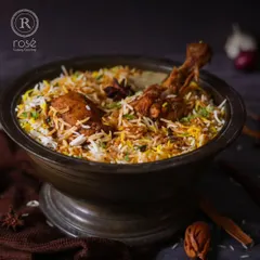 A rich and aromatic Chicken Biryani, cooked with long-grain basmati rice and fragrant spices. This dish is an epitome of luxury, meticulously crafted by our culinary maestros for an unmatched dining sensation.