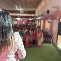 This is me addressing a full house of enthusiastic learners during one of my grooming seminars. My goal is to create an engaging environment where I can share my knowledge and empower every attendee to feel more confident and capable.