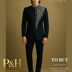 The Jodhpuri suit is a symbol of aristocratic style, and this dark navy blue creation is a testament to that legacy. I have enhanced its classic silhouette with intricate golden floral embroidery that cascades asymmetrically down the front, creating a look of undeniable power and elegance.