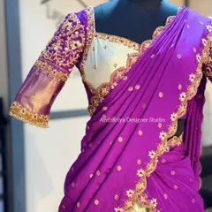 A detailed shot of the hand-worked blouse for a custom Langa Davani. The combination of zardosi, threadwork, and beadwork on the puff sleeves creates a rich, textured look.