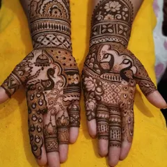 A classic Rajasthani bridal design featuring majestic peacocks and traditional temple dome (jharokha) motifs. This style is known for its full coverage and extremely fine details.