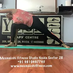 A variation of Side Angle Pose, showing a different arm position. This pose is a staple in my vinyasa flow classes.