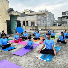 A moment of shared peace during an outdoor yoga session on our terrace. Practicing together in a group setting creates a powerful, collective energy that deepens everyone's individual meditation and practice.