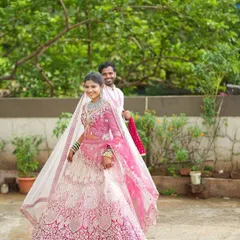Capture dynamic shots that bring your makeup artistry to life. This image shows the beautiful movement and detail of the ombre lehenga, a key element for a varied and professional MUA portfolio.