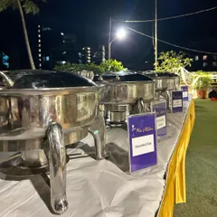 A full buffet setup on a terrace for an evening party. I can transform any space into an elegant dining area for your guests.