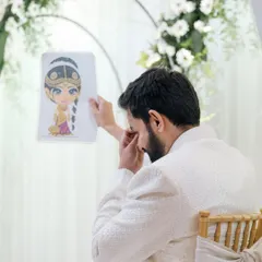 An emotional moment during a wedding game. It's these heartfelt, unexpected reactions that make for the most powerful memories.