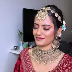 A close-up of the Phera makeup. I used warm, shimmery tones on the eyes to complement the gold jewelry and created a soft, glowing complexion that looks beautiful from every angle.