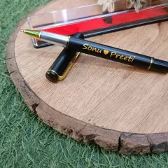 This personalized metal pen with the names 'Sonu' and 'Preeti' is a perfect gift for a couple. It comes in a clear protective case, ready for gifting.