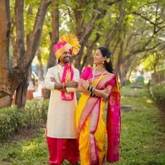 Capturing a real moment of laughter during an outdoor couple shoot. A park or garden is a great location choice for a relaxed and natural pre-wedding photography session.