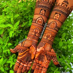 This is a classic full bridal mehndi design. I included detailed figures of a bride in a doli, palace architecture on the forearms, and delicate patterns, all done with my 100% natural henna for a guaranteed dark stain.