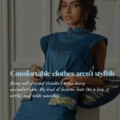 Comfortable clothes can be stylish. This deep blue jumpsuit with cap sleeves and art-detailed pockets proves that you don't have to sacrifice comfort for a well-dressed look.