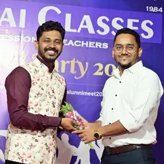 We believe in recognizing the efforts of our team. Here, one of our mentors is being felicitated for his role in guiding our students to success.
