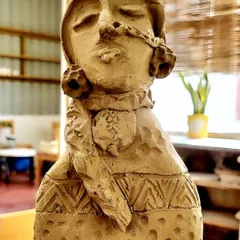 This clay sculpture was inspired by a picture I saw of a Lambadi tribal girl. I was captivated by her attitude and style, and I tried to capture that confident spirit and desi swag in this hand-built statue.