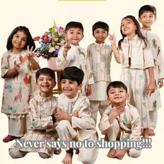 This image captures the fun spirit of my brand. All the kids are dressed in my playful animal-print collection, ready for a day of shopping and fun.
