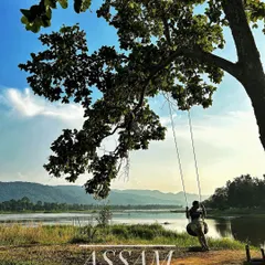 The peaceful riverside in Assam. We encourage travel that appreciates the quiet beauty and diverse landscapes of our country.